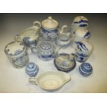 Various blue and white kitchen pottery, pair of Staffordshire dogs, figure of a seated naval