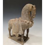 A Chinese pottery model of a Fereghan Horse, 20th century in Tang Style, standing, richly