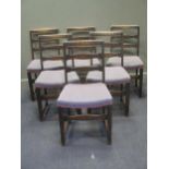 A set of six oak ladder back dining chairs (6)