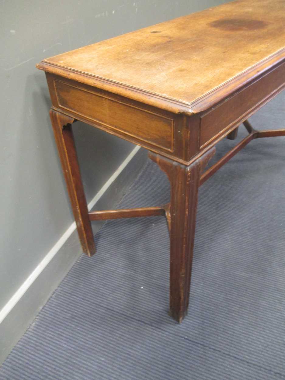 A George III style mahogany slender rectangular table, on moulded legs with shaped stretcher 77 x - Image 8 of 10