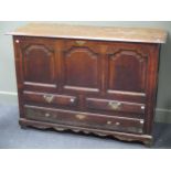 An English oak mule chest, with three panels and three drawers, 146 x 101 x 56.5cm