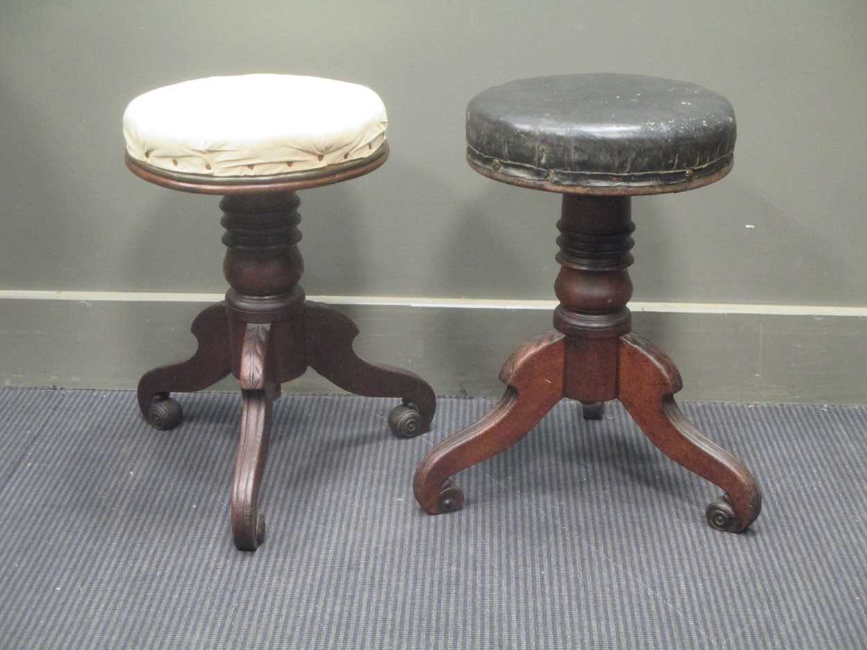 A pair of Regency mahogany piano stools, 50cm high (2)