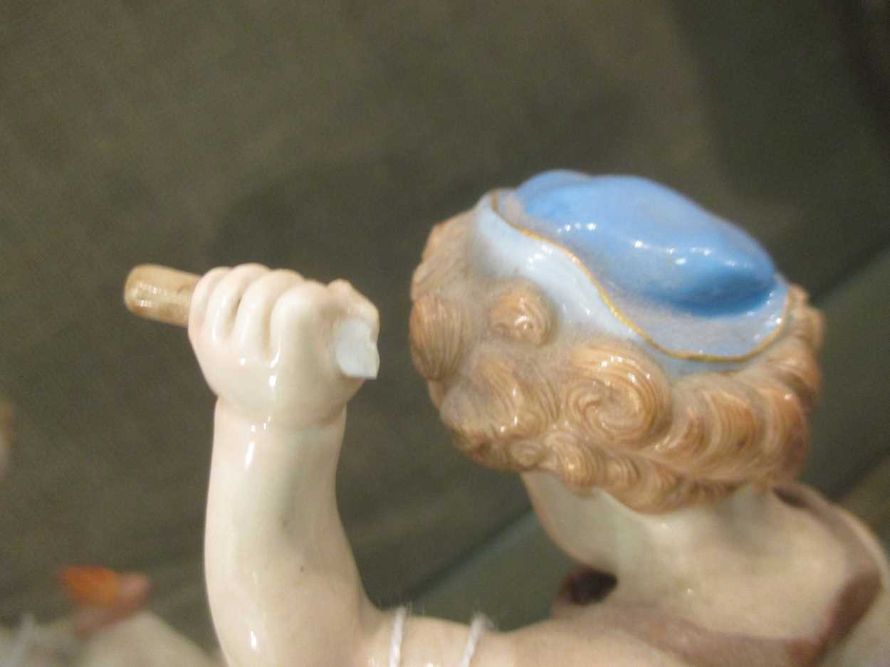 A pair of Meissen figures of cherubs, crossed swords mark, one incised L109, the other L14 (2) - Image 7 of 11