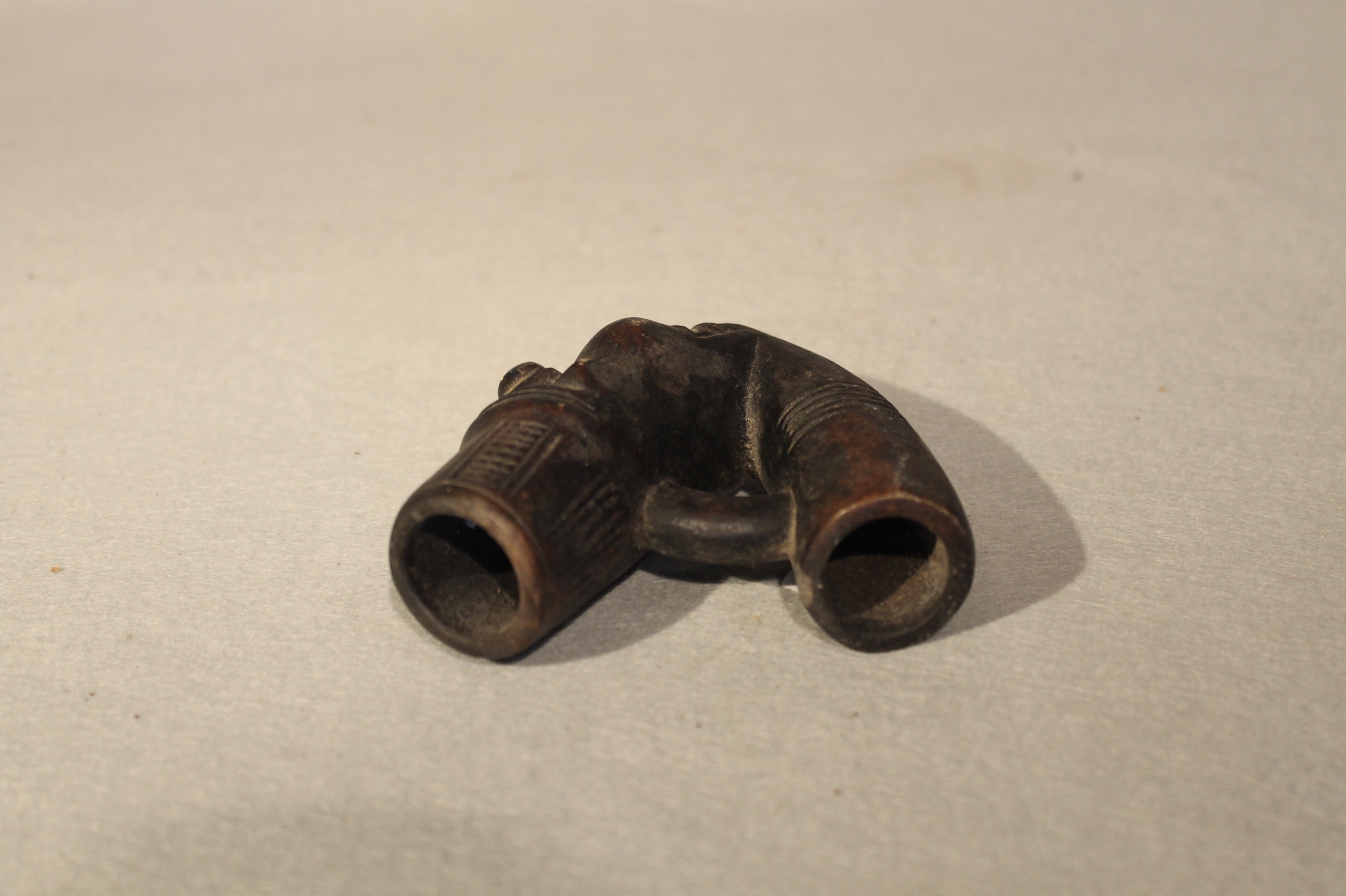 A group of African pottery including Cameroon items, comprising two smoking pipes, 18cm and 10 cm - Image 4 of 9