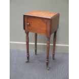 A mahogany drop leaf night table, on turned legs with castors, 19th century 79 x 41 x 34cm
