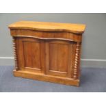 A Victorian walnut veneered serpentine chiffonier base, with flanking barley-twist side supports