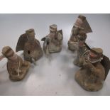 A group of six Chinese painted pottery tomb figures of musicians and entertainers, Han Dynasty,