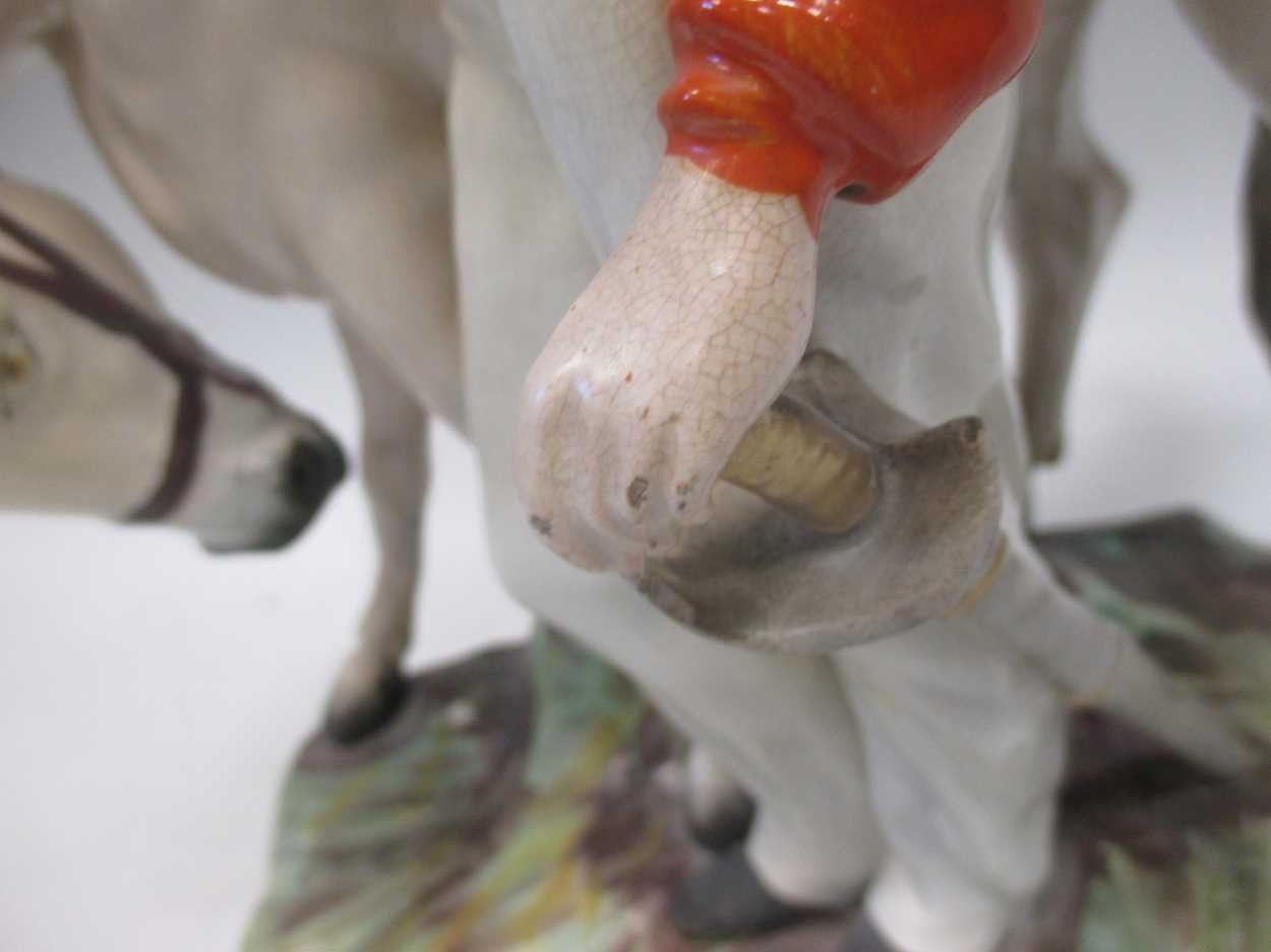 A large Staffordshire pottery group of Garibaldi standing aside his horse, 37cm high (restored) - Image 7 of 8