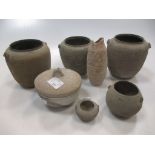 Seven Chinese ceramic small vessels, Han Dynasty, 10th century, including five graduated "cloth"