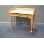 A late Victorian pine wash stand, on turned legs 86 x 91 x 47cm