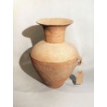 A Chinese pottery two handled vase, Neolithic, 39.5cm high