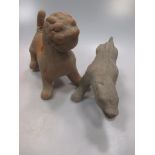 A Chinese grey pottery prowling dog and a red pottery chimera, both probably Han Dynasty (206 BC -