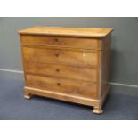 A Continental (probably German) commode chest with brass shield escutcheons to four graduated