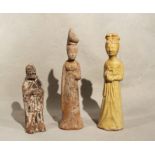 Three Chinese pottery figures, probably Sui Dynasty type,including a straw glazed standing slender