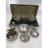 A miniature silver 20th century porringer, a cased pair of silver bonbon dishes, a pair of silver
