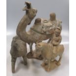 A group of three Chinese pottery models, a Bactrian camel, Han type, 40cm high; and a rider on horse