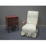 A 1930s armchair and a mahogany music cabinet of drawers (2)