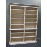 A large 20th century white painted wood open bookcase 227 x 174cm