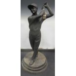 A cast iron figure of a golfer, on stepped base, 129cm high