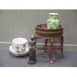 A 1920's coopered plant stand 60cm high and 65cm wide, a wash pail and bowl Losol ware, a bronzed
