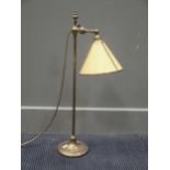 An adjustable brass desk lamp, early 20th century, 62cm high