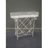 A wirework plant stand, 82 x 94 x 23cm