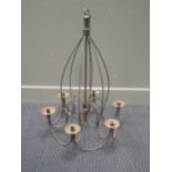 A six branch iron candelabra on chain 82cm high