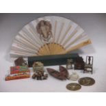 Various miniature dolls and accessories including furniture and furnishings