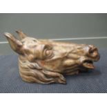 A late 19th or early 20th century painted terracotta model of a horses head
