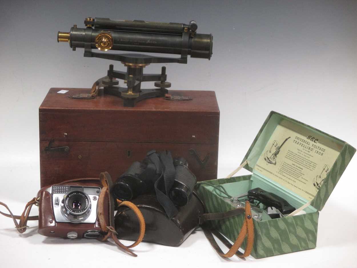 A Charles Baker, London, surveyor's level, no.3822, boxed with tripod and staff; a pair of