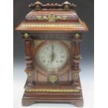 A walnut mantel clock, 70cm high