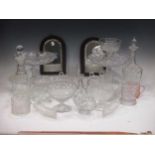 A collection of moulded and other glass including two decanters