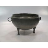 A Chinese bronze Tripod bowl, Ding, in Eastern Zhou style, the body cast with repeat tight