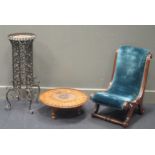 A shaped wrought iron stand, an inlaid wood stand and a small gout chair/stool (3)