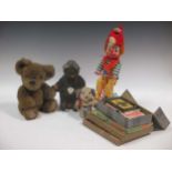 A tinplate-base clockwork bear drinking Pepsi, various jigsaws, beer-taps, etc