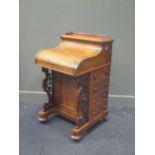 A mid Victorian walnut piano top Davenport, 94 x 52 x 57cm