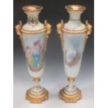 A pair of slender Sevres style porcelain vases with ormolu mounts, 48cm tall, lacking lids
