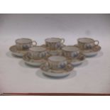 An early 19th century Barr, Flight and Barr tea service comprising six cups and saucers with gilt