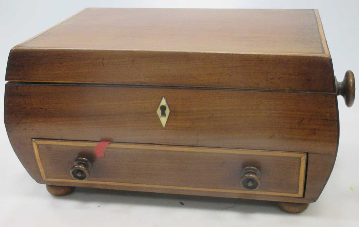 An early Victorian sarcophagus mahogany work box on later bun feet, 35cm wide