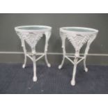 Three white painted cast metal 'Ferndowne' circular plant stands on three fern moulded legs, 47cm