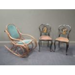 A bent wood rocking chair and two Victorian lacquered side chairs (3)