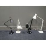 An anglepoise type lamp on caster base, two other anglepoise type lamps and two modern lamps (5)