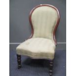 A Victorian spoon back nursing chair together with a mahogany wine table (2)