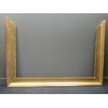 A large 19th century gilt wood frame with moulded slip. 252x176cms (one side detached but present).