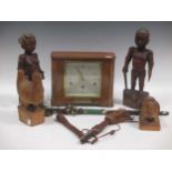 A collection of West Africa Ethnographia including: A standing couple A wand of office A dagger