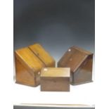 A mahogany sloping front stationery box, 35cm wide; an oak stationery box with sloping front, 38cm
