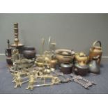 A collection of brass and copper ware including table easels and kettles (qty)