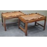 A pair of reproduction mahogany trays on stands,