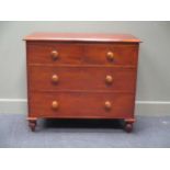 A Mid-Victorian mahogany chest of two short over two long drawers on turned feet 83 x 95 x 47cm