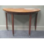 A George IV mahogany demi lune table; and a fold over top tea table (2)